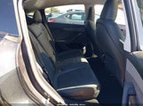Tesla Model Y Premium Rear-Wheel Drive/Standard Rear-Wheel Drive 7SAYGDED1TF427181 photo