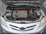 Toyota Corolla Le JTDBU4EE3B9129261 снимка