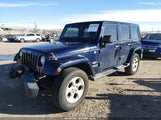 Jeep Wrangler Unlimited Sahara 1C4BJWEG6DL619494 fotografie