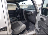 Jeep Wrangler Unlimited Sport 1J4BA3H10AL112148 photo