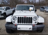 Jeep Wrangler Unlimited Sahara 1C4BJWEG9GL114800 снимка