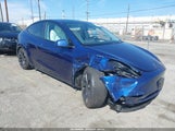Tesla Model Y Performance Dual Motor All-Wheel Drive 7SAYGDEF9PF662371 fotografie