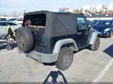 Jeep Wrangler Sport 1C4AJWAG8CL228556 снимка