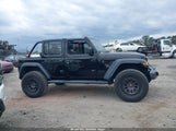 Jeep Wrangler Unlimited High Tide 4X4 1C4HJXDG6NW253313 photo
