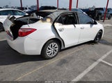 Toyota Corolla Le 5YFBURHEXJP775480 photo