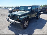 Jeep Wrangler Unlimited Sahara 1J4BA5H14AL182358 снимка
