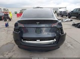 Tesla Model Y Long Range Dual Motor All-Wheel Drive 7SAYGDEE6RA239450 photo