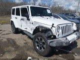 Jeep Wrangler Unlimited Sahara 1C4HJWEG9GL216883 photo