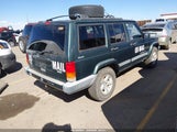 Jeep Cherokee Sport 1J4FF48S7YL174836 снимка