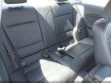 BMW 128I WBAUP7C53DVP25773 снимка