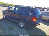Jeep Grand Cherokee Overland 1J8GW68J42C290993 снимка