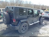Jeep Wrangler Unlimited Sahara 1J4HA5H19AL195455 fotografie
