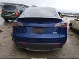 Tesla Model Y Performance Dual Motor All-Wheel Drive 7SAYGDEF9RF169843 photo