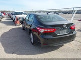 Toyota Camry Le 4T1B11HK4KU813351 photo