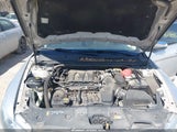 Ford Taurus Limited 1FAHP2F81EG100135 снимка