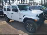 Jeep Wrangler 4-Door Sahara 4X4 1C4PJXEN7SW587502 photo