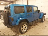 Jeep Wrangler Unlimited Sahara 1C4BJWEG4FL580956 снимка