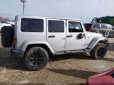 Jeep Wrangler Unlimited Sahara 1C4HJWEG9CL273188 photo