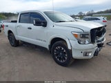 Nissan Titan Pro-4X 1N6AA1E51KN534042 photo