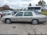 Cadillac Deville Standard 1G6KD54Y8XU709324 снимка
