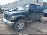 Jeep Wrangler Unlimited Sahara 1J4BA5H11AL126586 снимка