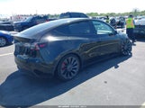 Tesla Model Y Performance Dual Motor All-Wheel Drive 7SAYGDEF8NF508036 photo