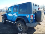 Jeep Wrangler Unlimited Sport 1J4BA3H15AL161197 снимка