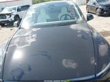 Tesla Model Y Premium Rear-Wheel Drive/Standard Rear-Wheel Drive 7SAYGDED7TF378147 photo