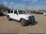 Jeep Wrangler Unlimited Sahara 1C4BJWEG0EL118151 fotografie