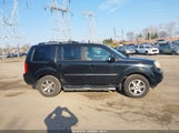 Honda Pilot Touring 5FNYF4H94BB083142 photo