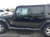 Jeep Wrangler Unlimited Sahara 1J4GB59157L227219 fotografie
