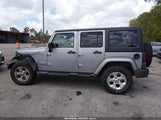 Jeep Wrangler Unlimited Sahara 1C4BJWEG2DL649513 снимка
