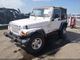 Jeep Wrangler Sport 1J4FA49SXYP700530 снимка