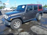 Jeep Wrangler Unlimited Sahara 1C4BJWEGXGL167215 снимка