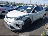 Toyota C-Hr Le JTNKHMBX7K1040006 photo