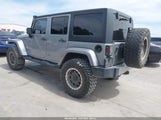 Jeep Wrangler Unlimited Sahara 1C4HJWEG9EL214208 photo
