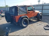 Jeep Wrangler Sport 1J4FA49S9YP803678 снимка
