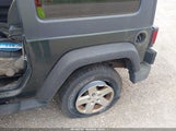 Jeep Wrangler Sport 1J4GA2D13AL128009 снимка