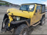 Jeep Wrangler Sport 1J4FA49S2YP749270 снимка