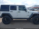 Jeep Wrangler Unlimited Sport 1C4HJWDG3GL346224 снимка