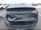 Tesla Model Y Performance Dual Motor All-Wheel Drive 7SAYGDEF9RA285105 photo