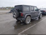 Jeep Wrangler Unlimited Sahara 4X4 1C4HJXEN9JW188898 снимка