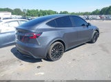 Tesla Model Y Standard Range Rear-Wheel Drive 5YJYGDED4MF106198 photo