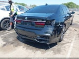 BMW 750I xDrive WBA7U2C04MCG17061 снимка