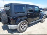 Jeep Wrangler Unlimited Sahara 1C4HJWEG9GL102561 photo