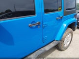 Jeep Wrangler Unlimited Sahara 1C4BJWEGXCL142423 photo