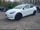 Tesla Model Y Long Range Dual Motor All-Wheel Drive 7SAYGAEE5SF254125 photo