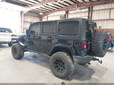 Jeep Wrangler Unlimited Sahara 1C4BJWEG8GL138246 photo
