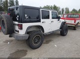 Jeep Wrangler Unlimited Sport 1J4BA3H16AL180034 photo