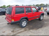 Jeep Cherokee Sport 1J4FT48S8YL238164 снимка